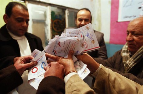 Officials count ballots after polls closed in Cairo, January 15, 2014. REUTERS/Mohamed Abd El Ghany Officials count ballots after polls closed in Cairo, January 15, 2014. REUTERS/Mohamed Abd El Ghany