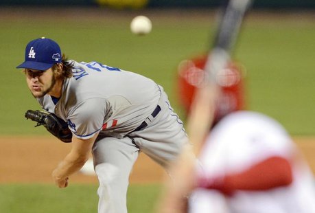 Oct 18, 2013; St. Louis, MO, USA; Los Angeles Dodgers starting pitcher Clayton Kershaw throws a pitch against the St. Louis Cardinals during Oct 18, 2013; St. Louis, MO, USA; Los Angeles Dodgers starting pitcher Clayton Kershaw throws a pitch against the St. Louis Cardinals during
