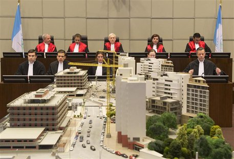 Judges (top row, L-R) Walid Akoum, Janet Nosworthy, David Re, Micheline Braidi and Nicola Lettier preside over the courtroom of the Special Judges (top row, L-R) Walid Akoum, Janet Nosworthy, David Re, Micheline Braidi and Nicola Lettier preside over the courtroom of the Special