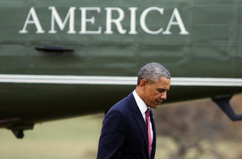 U.S. President Barack Obama steps off Marine One after landing on the South Lawn of the White House in Washington, January 15, 2014. REUTERS U.S. President Barack Obama steps off Marine One after landing on the South Lawn of the White House in Washington, January 15, 2014. REUTERS