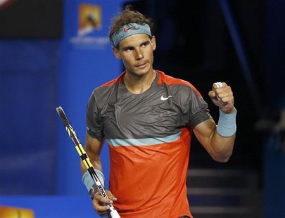 Rafael Nadal of Spain celebrates defeating Thanasi Kokkinakis of Australia during their men's singles match at the Australian Open 2014 tenn Rafael Nadal of Spain celebrates defeating Thanasi Kokkinakis of Australia during their men's singles match at the Australian Open 2014 tenn