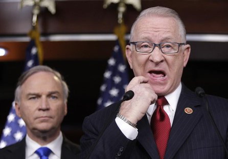 U.S. House Armed Services Committee Chairman Rep. Buck McKeon (R-CA) (R), flanked by Representative J. Randy Forbes (R-VA), pauses during hi U.S. House Armed Services Committee Chairman Rep. Buck McKeon (R-CA) (R), flanked by Representative J. Randy Forbes (R-VA), pauses during hi