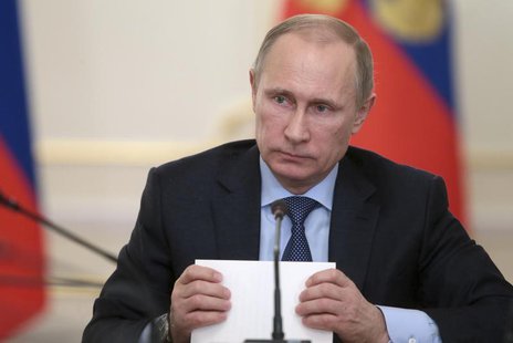 President Vladimir Putin chairs a government meeting in Novo-Ogaryovo residence outside Moscow January 15, 2014. REUTERS/Mikhail Metzel/RIA President Vladimir Putin chairs a government meeting in Novo-Ogaryovo residence outside Moscow January 15, 2014. REUTERS/Mikhail Metzel/RIA