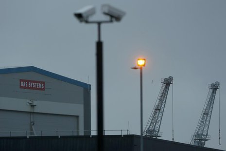 A BAE Systems sign is seen at the naval dockyards in Portsmouth, southern England November 6, 2013. REUTERS/Stefan Wermuth A BAE Systems sign is seen at the naval dockyards in Portsmouth, southern England November 6, 2013. REUTERS/Stefan Wermuth