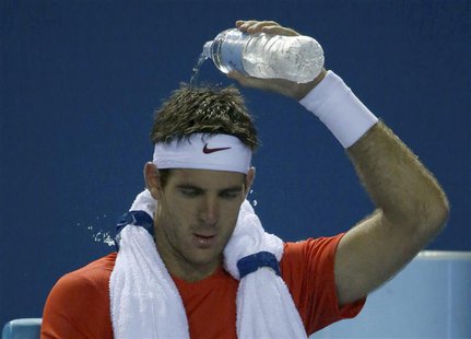 Juan Martin Del Potro of Argentina cools off during his men's singles match against Roberto Bautista Agut of Spain at the Australian Open 20 Juan Martin Del Potro of Argentina cools off during his men's singles match against Roberto Bautista Agut of Spain at the Australian Open 20