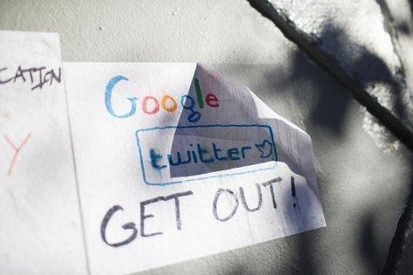 Signs in opposition of technology companies are seen in San Francisco, California December 9, 2013. REUTERS/Stephen Lam Signs in opposition of technology companies are seen in San Francisco, California December 9, 2013. REUTERS/Stephen Lam