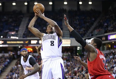 Sacramento Kings small forward Rudy Gay (8) shoots the ball against Portland Trail Blazers shooting guard Wesley Matthews (2) during the fou Sacramento Kings small forward Rudy Gay (8) shoots the ball against Portland Trail Blazers shooting guard Wesley Matthews (2) during the fou