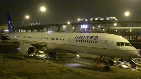A United Airlines airplane painted in its new corporate logo sits at a gate at Liberty International Airport in Newark, New Jersey, February A United Airlines airplane painted in its new corporate logo sits at a gate at Liberty International Airport in Newark, New Jersey, February
