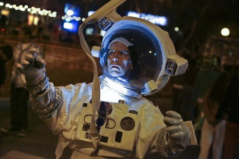 Tom Coffey dresses as a character from the movie "Gravity" at the West Hollywood Halloween Costume Carnaval, which attracts nearly 500,000 p Tom Coffey dresses as a character from the movie "Gravity" at the West Hollywood Halloween Costume Carnaval, which attracts nearly 500,000 p