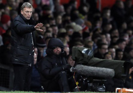 Manchester United's manager David Moyes instructs his team during their English Premier League soccer match against Swansea City at Old Traf Manchester United's manager David Moyes instructs his team during their English Premier League soccer match against Swansea City at Old Traf