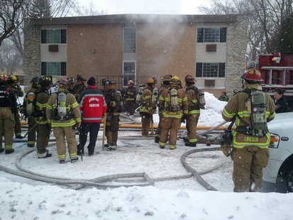 Fire crews battle flames at Nicolet Apartments on Huth Street in Green Bay on Jan. 16, 2014. (Photo from: WTAQ's Mark Daniels). Fire crews battle flames at Nicolet Apartments on Huth Street in Green Bay on Jan. 16, 2014. (Photo from: WTAQ's Mark Daniels).