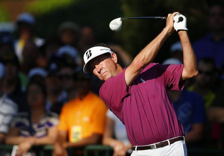 Davis Love III of the U.S. tees off on the 10th hole during the first round of the 2013 PGA Championship golf tournament at Oak Hill Country Davis Love III of the U.S. tees off on the 10th hole during the first round of the 2013 PGA Championship golf tournament at Oak Hill Country