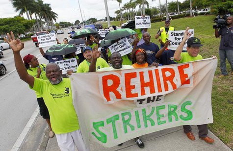 Walmart workers and supporters protest low wages outside one of the company's stores in Miami Gardens, Florida September 5, 2013. REUTERS/Jo Walmart workers and supporters protest low wages outside one of the company's stores in Miami Gardens, Florida September 5, 2013. REUTERS/Jo