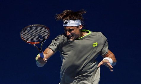 David Ferrer of Spain hits a return to Jeremy Chardy of France during their men's singles match at the Australian Open 2014 tennis tournamen David Ferrer of Spain hits a return to Jeremy Chardy of France during their men's singles match at the Australian Open 2014 tennis tournamen