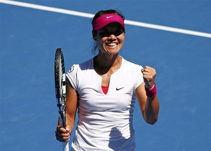 Li Na of China celebrates defeating Lucie Safarova of the Czech Republic during their women's singles match at the Australian Open 2014 tenn Li Na of China celebrates defeating Lucie Safarova of the Czech Republic during their women's singles match at the Australian Open 2014 tenn