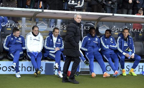 Chelsea manager Jose Mourinho (C) attends their English Premier League soccer match against Hull City at The KC Stadium in Hull, northern En Chelsea manager Jose Mourinho (C) attends their English Premier League soccer match against Hull City at The KC Stadium in Hull, northern En