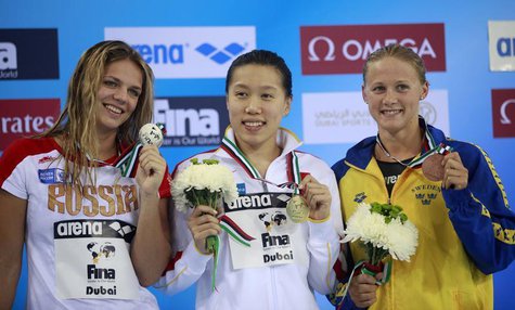 Gold medallist Liu Xiaoyu (C) of China poses with silver medallist Yulia Efimova (L) of Russia and bronze medallist Rebecca Ejdervik of Swed Gold medallist Liu Xiaoyu (C) of China poses with silver medallist Yulia Efimova (L) of Russia and bronze medallist Rebecca Ejdervik of Swed