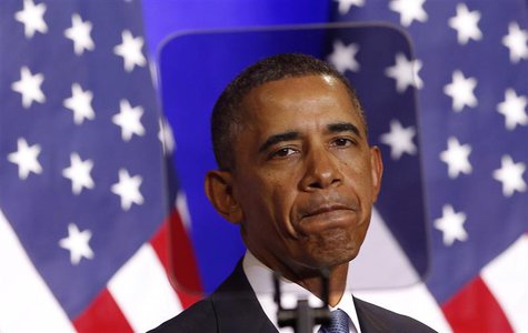 U.S. President Barack Obama is seen through a teleprompter as he speaks about the National Security Agency from the Justice Department in Wa U.S. President Barack Obama is seen through a teleprompter as he speaks about the National Security Agency from the Justice Department in Wa