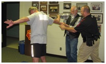 A member of a past Citizen's Academy learns how to properly arrest a suspect. A member of a past Citizen's Academy learns how to properly arrest a suspect.