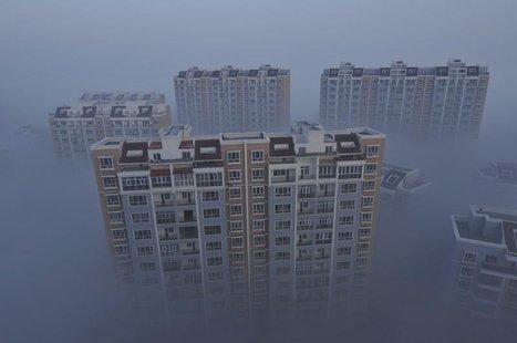 A residential compound is seen during a smoggy day in Wujiaqu, Xinjiang Uighur autonomous region, November 19, 2013. REUTERS/Stringer A residential compound is seen during a smoggy day in Wujiaqu, Xinjiang Uighur autonomous region, November 19, 2013. REUTERS/Stringer