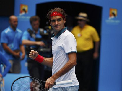 Roger Federer of Switzerland celebrates defeating Teymuraz Gabashvili of Russia during their men's singles match at the Australian Open 2014 Roger Federer of Switzerland celebrates defeating Teymuraz Gabashvili of Russia during their men's singles match at the Australian Open 2014