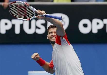 Grigor Dimitrov of Bulgaria celebrates defeating Milos Raonic of Canada during their men's singles match at the Australian Open 2014 tennis Grigor Dimitrov of Bulgaria celebrates defeating Milos Raonic of Canada during their men's singles match at the Australian Open 2014 tennis