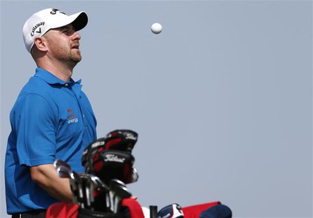 Craig Lee of Scotland plays with the ball on the third hole during the Abu Dhabi Golf championship January 18, 2014. REUTERS/Ahmed Jadallah Craig Lee of Scotland plays with the ball on the third hole during the Abu Dhabi Golf championship January 18, 2014. REUTERS/Ahmed Jadallah