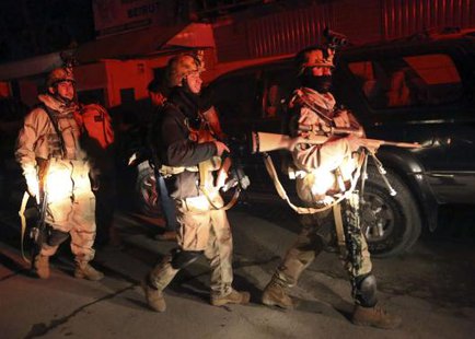 Afghan security forces arrive at the scene of an explosion in Kabul January 17, 2014.
CREDIT: REUTERS/OMAR SOBHANI Afghan security forces arrive at the scene of an explosion in Kabul January 17, 2014.
CREDIT: REUTERS/OMAR SOBHANI