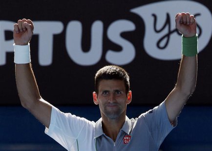 Novak Djokovic of Serbia celebrates defeating Fabio Fognini of Italy in their men's singles match at the Australian Open 2014 tennis tournam Novak Djokovic of Serbia celebrates defeating Fabio Fognini of Italy in their men's singles match at the Australian Open 2014 tennis tournam