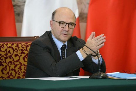 France's Finance Minister Pierre Moscovici attends a joint news conference with China's Vice Premier Ma Kai (not pictured) following a signi France's Finance Minister Pierre Moscovici attends a joint news conference with China's Vice Premier Ma Kai (not pictured) following a signi