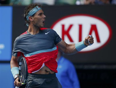 Rafael Nadal of Spain celebrates winning the second set of his men's singles match against Kei Nishikori of Japan at the Australian Open 201 Rafael Nadal of Spain celebrates winning the second set of his men's singles match against Kei Nishikori of Japan at the Australian Open 201
