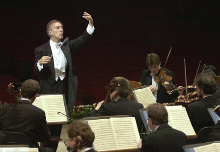 Italian conductor Claudio Abbado conducts the Berliner Philharmonic Orchestra during rehearsal in Rome's Santa Cecilia Auditorium February 8 Italian conductor Claudio Abbado conducts the Berliner Philharmonic Orchestra during rehearsal in Rome's Santa Cecilia Auditorium February 8