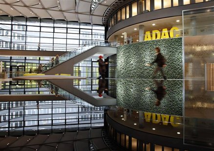 People walk inside the ADAC headquarter in Munich January 20, 2014. REUTERS/Michaela Rehle People walk inside the ADAC headquarter in Munich January 20, 2014. REUTERS/Michaela Rehle