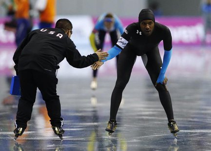 Shani Davis (R) of the U.S. reacts after the men's 1,000m event at the ISU World Sprint Speed Skating Championships in Nagano, central Japan Shani Davis (R) of the U.S. reacts after the men's 1,000m event at the ISU World Sprint Speed Skating Championships in Nagano, central Japan