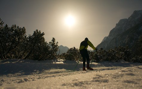 A person cross country skiing. A person cross country skiing.