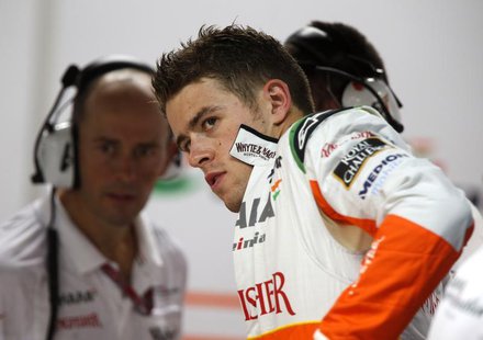 Force India Formula One driver Paul di Resta of Britain is seen in the team's garage during the second practice session of the Singapore F1 Force India Formula One driver Paul di Resta of Britain is seen in the team's garage during the second practice session of the Singapore F1
