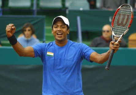 India's Mahesh Bhupathi celebrates after he and his teammate Leander Paes (unseen) won the Davis Cup doubles tennis match against Romania's India's Mahesh Bhupathi celebrates after he and his teammate Leander Paes (unseen) won the Davis Cup doubles tennis match against Romania's