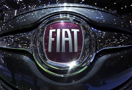 The Fiat logo is seen in a car displayed on the Fiat booth during the first media day of the Geneva Auto Show at the Palexpo in Geneva in th The Fiat logo is seen in a car displayed on the Fiat booth during the first media day of the Geneva Auto Show at the Palexpo in Geneva in th