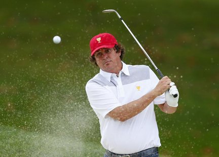 U.S. team member Jason Dufner hits from a sand trap on the fourth hole during the first practice round for the 2013 Presidents Cup golf tour U.S. team member Jason Dufner hits from a sand trap on the fourth hole during the first practice round for the 2013 Presidents Cup golf tour
