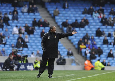 Notts County's coach Paul Ince reacts during their FA Cup soccer match against Manchester City at Manchester, northern England February 20, Notts County's coach Paul Ince reacts during their FA Cup soccer match against Manchester City at Manchester, northern England February 20,