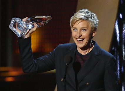 Ellen DeGeneres accepts the award for favorite daytime tv host for her show "The Ellen DeGeneres Show" at the 2014 People's Choice Awards in Ellen DeGeneres accepts the award for favorite daytime tv host for her show "The Ellen DeGeneres Show" at the 2014 People's Choice Awards in