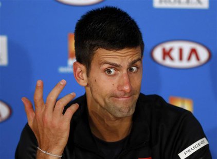 Novak Djokovic of Serbia reacts during a news conference after losing his men's singles quarter-final tennis match against Stanislas Wawrink Novak Djokovic of Serbia reacts during a news conference after losing his men's singles quarter-final tennis match against Stanislas Wawrink