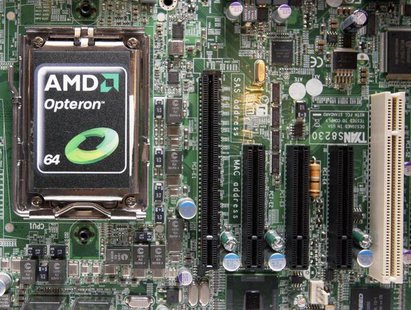 A new AMD Opteron 6000 series processor is seen on a motherboard during a product launch in Taipei April 14, 2010. REUTERS/Pichi Chuang A new AMD Opteron 6000 series processor is seen on a motherboard during a product launch in Taipei April 14, 2010. REUTERS/Pichi Chuang