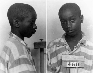 George Stinney Jr appears in an undated police booking photo provided by the South Carolina Department of Archives and History. REUTERS/Sout George Stinney Jr appears in an undated police booking photo provided by the South Carolina Department of Archives and History. REUTERS/Sout
