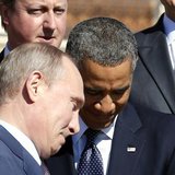 Russian President Vladimir Putin (L) walks past U.S. President Barack Obama (C) during a group photo at the G20 Summit in St. Petersburg Sep Russian President Vladimir Putin (L) walks past U.S. President Barack Obama (C) during a group photo at the G20 Summit in St. Petersburg Sep
