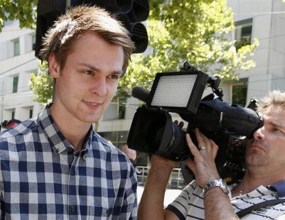 Daniel Dobson, a 22-year-old Briton arrested during an Australian Open 2014 tennis match at Melbourne Park on Tuesday, leaves Melbourne Magi Daniel Dobson, a 22-year-old Briton arrested during an Australian Open 2014 tennis match at Melbourne Park on Tuesday, leaves Melbourne Magi
