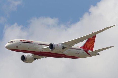 An Air India Airlines Boeing 787 dreamliner takes part in a flying display during the 50th Paris Air Show at the Le Bourget airport near Par An Air India Airlines Boeing 787 dreamliner takes part in a flying display during the 50th Paris Air Show at the Le Bourget airport near Par