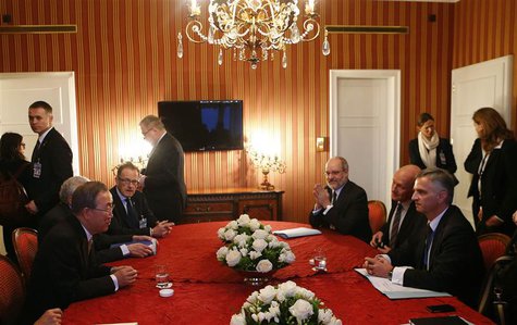 Swiss President Didier Burkhalter (seated R) and U.N. Secretary-General Ban Ki-moon (seated L) meet prior to peace talks in Montreux January Swiss President Didier Burkhalter (seated R) and U.N. Secretary-General Ban Ki-moon (seated L) meet prior to peace talks in Montreux January