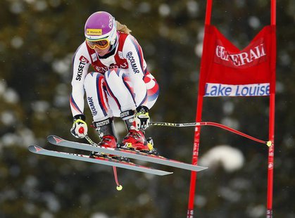 Chemmy Alcott of Britain takes air past a gate during alpine skiing training for the Women's World Cup Downhill in Lake Louise, Alberta, Nov Chemmy Alcott of Britain takes air past a gate during alpine skiing training for the Women's World Cup Downhill in Lake Louise, Alberta, Nov