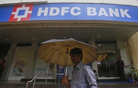 A customer walks outside an HDFC Bank branch in Mumbai July 17, 2013. REUTERS/Danish Siddiqui A customer walks outside an HDFC Bank branch in Mumbai July 17, 2013. REUTERS/Danish Siddiqui